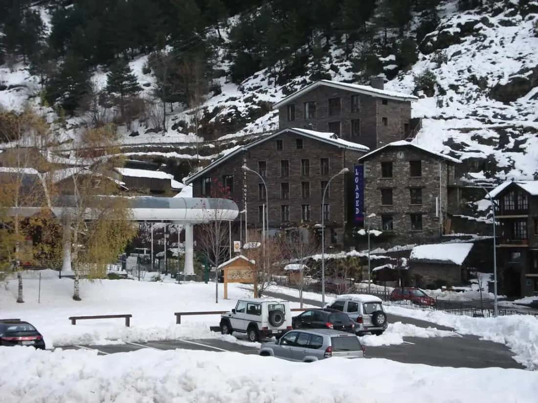 Hotel Montané exterior with mountain backdrop in Arinsal, Andorra